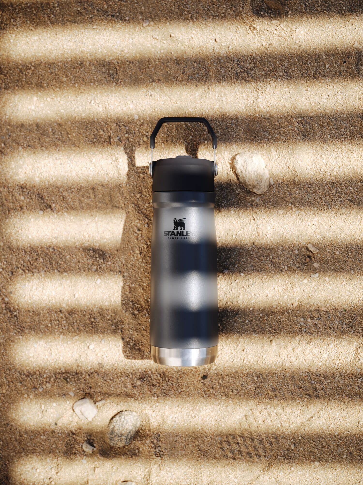 STANLEY IceFlow Flip Straw Water Bottle 22 oz | Built-In Straw for Travel and Sports | Lightweight and Leak Resistant | Insulated Stainless Steel | BPA-Free | Charcoal - Image 5